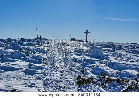 Cross On Top Of Pilsko Mountain In Winter In Beskidy Mountains In Poland