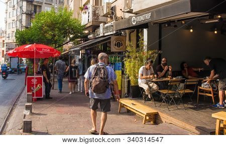 Istanbul, Turkey - September 10th 2019. A Tourist Walks Down A Street In The Firuzaga - Cihangir Are