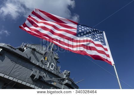 Charleston, South Carolina, United States, Novemner 2019, Us Flag The Stars And Stripes With The Uss