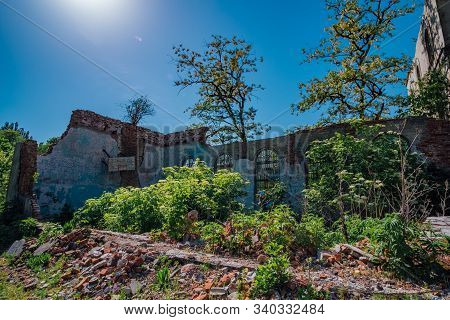 Ruined Overgrown School In Ghost Mining Town Akarmara, Consequences Of War In Abkhazia, Green Post-a