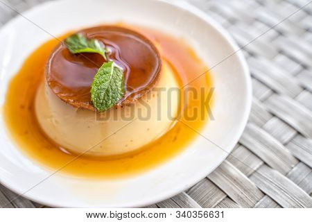 Pudding Caramel Custard With Top View Of A Creme Caramel, Caramel Custard Or Custard Pudding In Whit