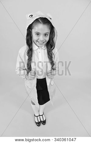 Frog Style. Schoolgirl Hooded Raincoat Enjoy Fall Weather. Rainproof Accessories Make Rainy Fall Day