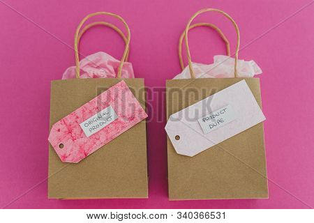 Original Product Vs Dupe Imitation, Shopping Bags With Simila Price Tags Side By Side Symbol Of Chea
