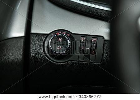 Novosibirsk, Russia - December 06, 2019:  Opel Mokka,  Close-up Of The  Headlight Setting Buttons. M
