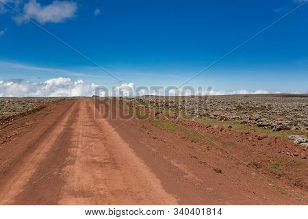 Road In Top Of Ethiopian Bale Mountains National Park. Wilderness Pure Nature, Sunny Day With Blue S