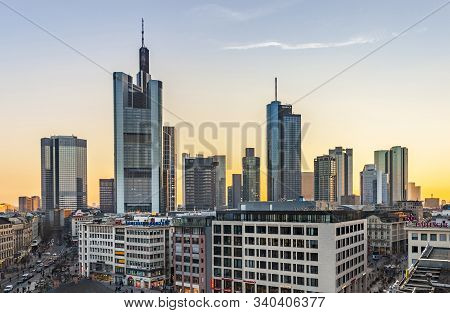 Frankfurt, Germany - Mar 18, 2016: View To Skyline Of Frankfurt In Sunset. Most Skyscrapers Belong T