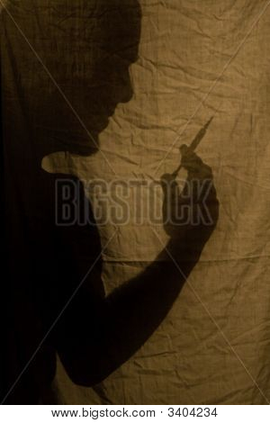 주사기와 그림자