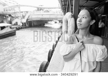 Young Beautiful Tourist Woman Exploring The City Of Bangkok