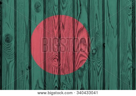 Bangladesh Flag Depicted In Bright Paint Colors On Old Wooden Wall. Textured Banner On Rough Backgro