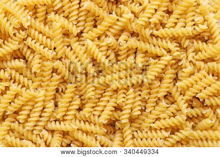Fusilli Spaghetti Pattern Background. Fusilli Background. Fusilli Spaghetti