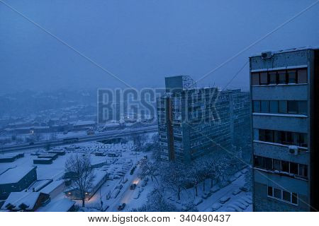 Beautiful Winter View Of Houses And Buildings With Roofs Covered With Heavy Snow. In Snowy Season, R