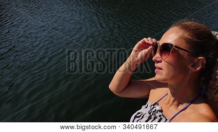 Woman Shooting Self Portrait. Take Photo And Video On Smartphone. Girl Rest, Relax, Walk In Sunglass