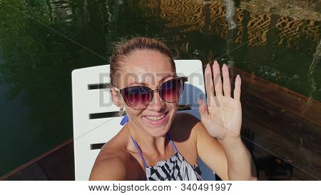 Woman Shooting Self Portrait. Take Photo And Video On Smartphone. Girl Rest, Relax, Walk In Sunglass