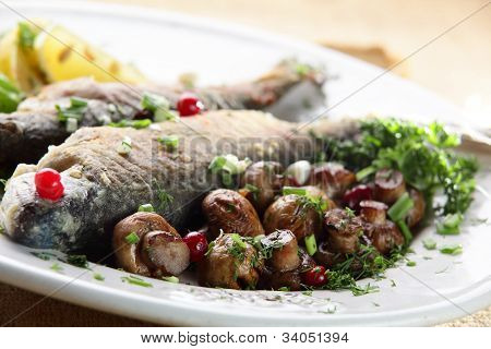 Pesce con funghi