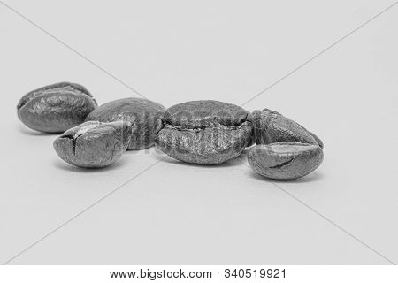 Close Up Of Coffee Beans On A White Background