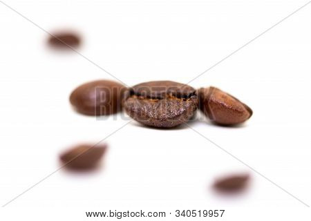 Close Up Of Coffee Beans On A White Background