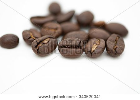 Close Up Of Coffee Beans On A White Background