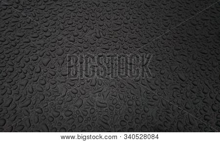 Beautiful Background Texture Of Rain Water Drops On Grey Black Metal Surface. Beautiful Backgrounds.