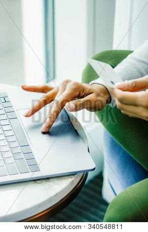 Portrait Oriented Photo Highlights Online Shopping As One Woman With Pretty Blush Pink Nails Clicks 