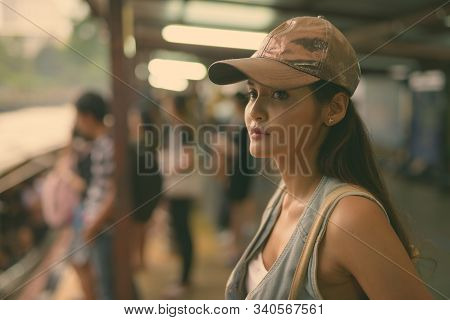 Young Beautiful Asian Tourist Woman Exploring The City Of Bangkok, Thailand