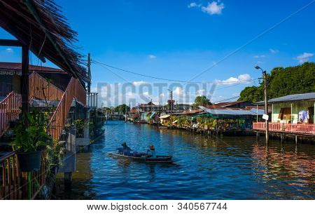 Bangkok, Thailand - November 30, 2019: Floating food boat on Khlong Bangkok Yai canal