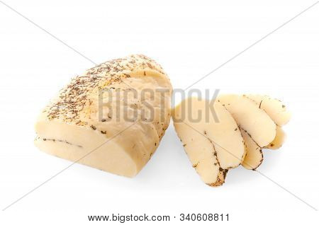 Halumi Cheese With Spices. Three Pieces Of Cheese Are Cut Off. Isolated. On A White Background Close