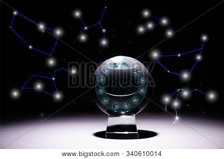 Crystal Ball With Zodiac Signs Isolated On Black With Constellations