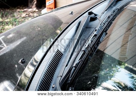 Car Windshield Wiper Close-up With Dusty Feature