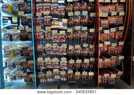 Energizer, Duracell, Eveready Aaa, Aa Batteries Displayed For Sale. Batteries Of Different Sizes In 