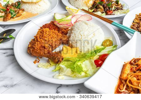 Ayam Penyet Is Indonesian East Javanese Cuisine - Consisting Of Fried Chicken That Is Smashed With T