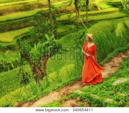 Woman walking on Tegalalang Rice Terrace, Bali
