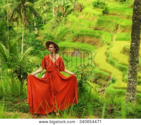 Woman walking on Tegalalang Rice Terrace, Bali