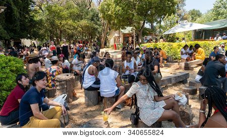 Johannesburg, South Africa - October 2019: People Eating And Socializing At Fourways Farmers Market