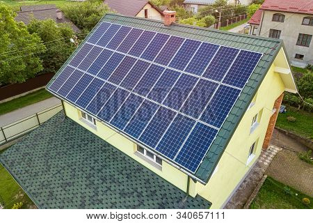 Aerial Top View Of New Modern Residential House Cottage With Blue Shiny Solar Photo Voltaic Panels S