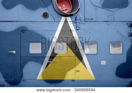 Saint Lucia Flag Depicted On Side Part Of Military Armored Helicopter Closeup. Army Forces Aircraft 