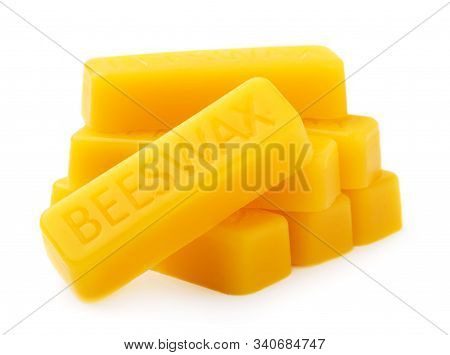 Bars Of Natural Organic Beeswax Isolated On A White Background. Production Ingredient For Medical An