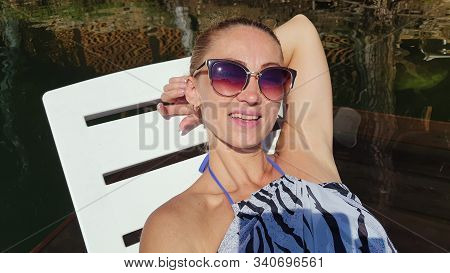 Woman Shooting Self Portrait. Take Photo And Video On Smartphone. Girl Rest, Relax, Walk In Sunglass