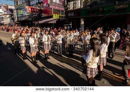 Puli, Taiwan - December 14th, 2019: people parade in Puli carnival at Nantou, Taiwan