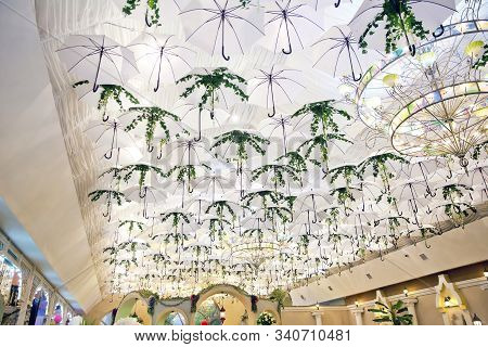 White And Green Unbrellas On Downtown : Hang On The Ceiling, In The Restaurant . White Unbrellas Bac