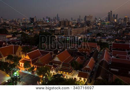 Bangkok, Thailand - November 23, 2019: Evening view of Bangkok downtown from Golden Mountain - Wat Saket