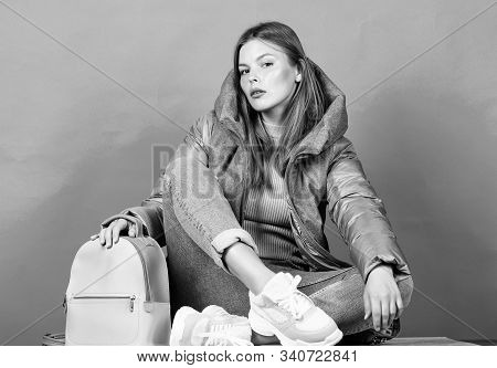 Posing For Photo. Flu And Cold Season. Leather Bag Fashion. Girl In Puffed Coat. Faux Fur Fashion. W