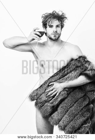 Guy Attractive Rich Posing Fur Coat On Naked Body. Fashion And Pathos. Rich Athlete Enjoy His Life. 
