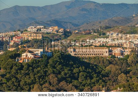 Panoramic View In Malaga From The Hill Of The Barcenillas District With Sagrada Familia El Monte. Hi