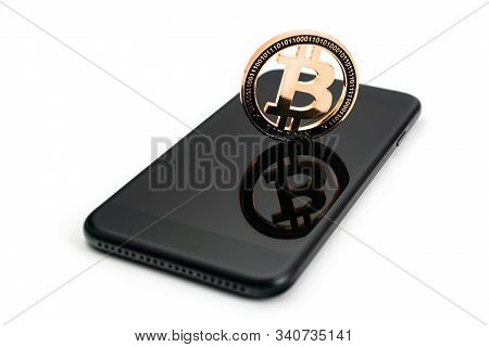 Bit Coin. Gold Cryptocurrency, Black Smartphone Isolated On White Background. Litecoin, Ethereum Cry