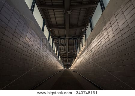 Accessible Ramp In A Train Station To Give Access To The Platform And The Railway Tracks To Persons 