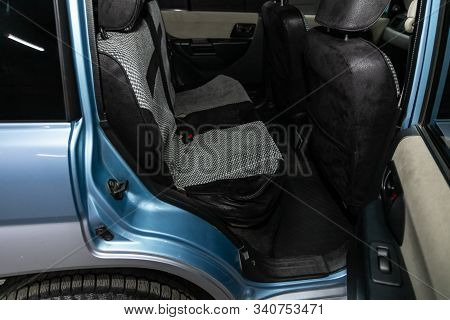 Novosibirsk, Russia - October 9, 2019:   Mitsubishi Pajero Io,  Close-up Of The Black  Anad Gray Rea