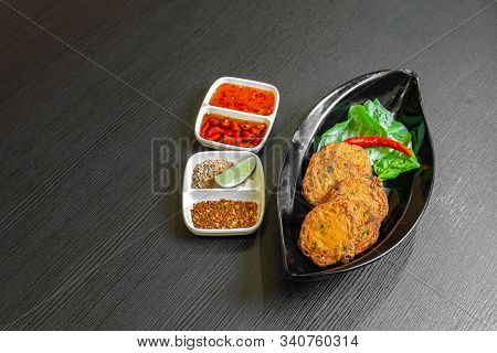 Spicy Fried Fish Cake, (tod Mun Pla), A Traditional Thailand Appetizer Is Made With Fresh Fish Paste