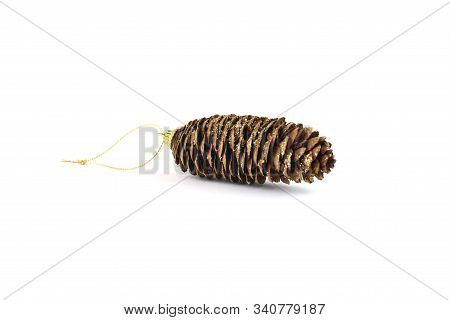 Fir Cone With Sparkles Isolated On White Background. Greeting Card. New Years Holidays. Decoration