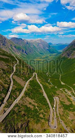 Trolls Path Trollstigen Winding Scenic Mountain Road With Many Cars, Norway Europe. National Tourist