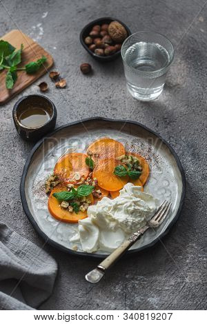 Buratta Italian Cheese With Fruits Served On Handmade Plate